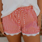red picnic shorts