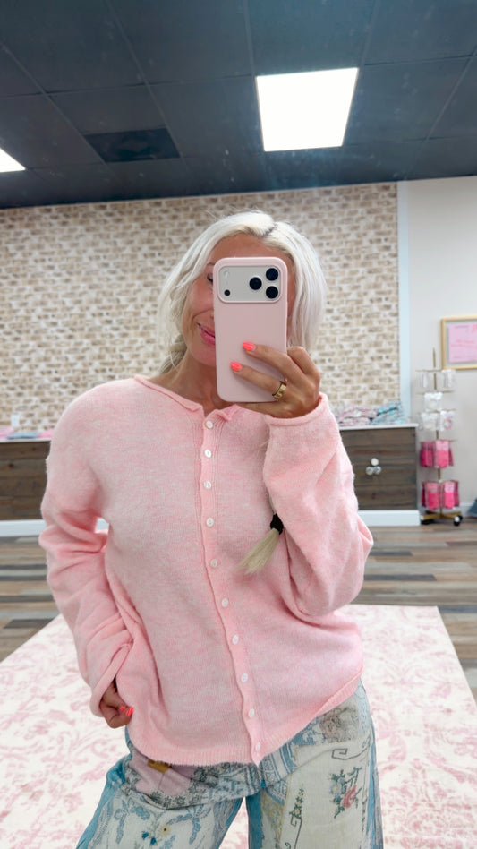 pink knit cardigan