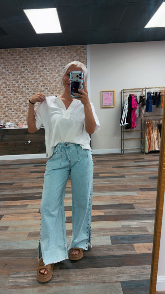 washed split neck raw edge short sleeve knit top